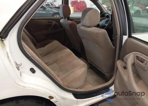 2000 Toyota Camry Le from USA, damaged, VIN JT2BG22K2Y0435069